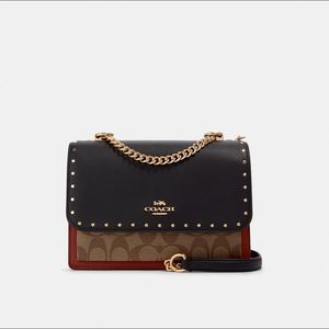 Klare Crossbody In Signature Canvas With Rivets